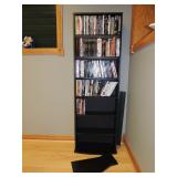 Black Shelving for DVDs has 7 shelves shown and 2 extra 19.75 inches wide and 60.25 inches high.  $5