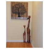 Solid Wooden Giraffes tall one is approximately 5 ft. and shorter one is 40.5 inches tall. 