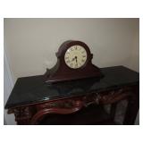 Mantel Clock by Howard Miller 19 inches wide and 11.5 tall. $125.00
