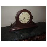 Mantel Clock by Howard Miller 19 inches wide and 11.5 tall. $125.00