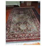 Nourison’s 2000 Burgundy 26,000 tufts to Sq. Ft. Wool and Silk Rug Measuring approximately 5.5 ft. w