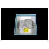 3- Morgan silver dollars, worn