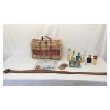 Straw bad, several bottles of perfume, two