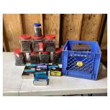 Various nails and staples in crate