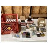 Various nails and screws in crate
