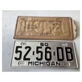 1950 Michigan license plate with sleeve never used