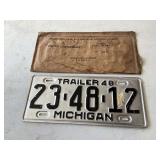 1948 Michigan license plate with sleeve