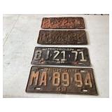 Three vintage Michigan license plates