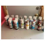 Various clear coat cans in crate