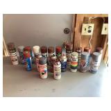 Colorful primer cans in crate