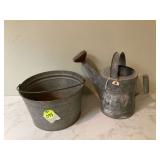 Metal watering can and bucket