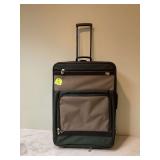 Large rolling suitcase by American Tourister - durable and spacious luggage perfect for