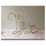 Classic metal towel holders with a regal Hollywood feel