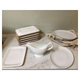 Set of 6 oval and rectangle plates with gravy boat