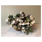 Faux flowers in basket
