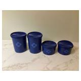 4-piece blue canister set by Tupperware with starburst design