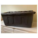 Extra-large 40-gallon tote with rugs and pillows