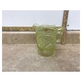 Old uranium glass pitcher with chip