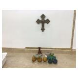 Home décor items from Crate and Barrel including a decorative cross tin