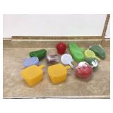 Small stackable containers for keeping produce fresh in the fridge