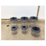 Black and clear Tupperware canister set