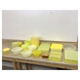 Various yellow Tupperware containers