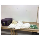 Table linens in tote with lid