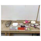 Wire basket filled with beauty control bags photo album tray and