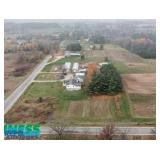 Home, Barn, Sheds, and 10 acres in Sand Lake, MI (A LastBidRealEstate Auction)