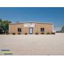 LASTBIDrealestate.com Online Real Estate Auction on August 6, 2025 of a 28,570 sq. ft. Industrial building in Norton Shores, MI